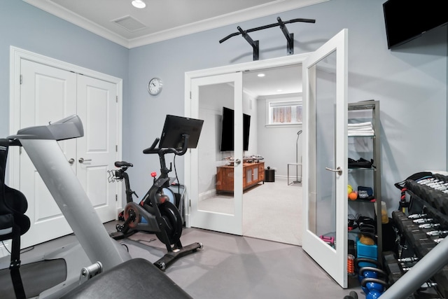 exercise room with carpet, french doors, and crown molding