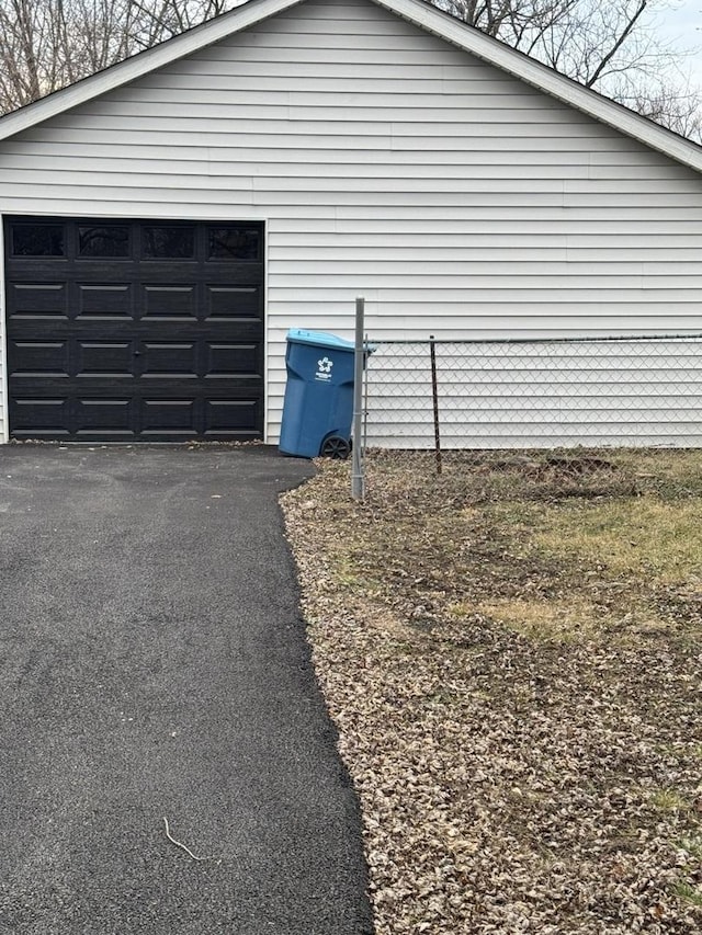 detached garage with fence