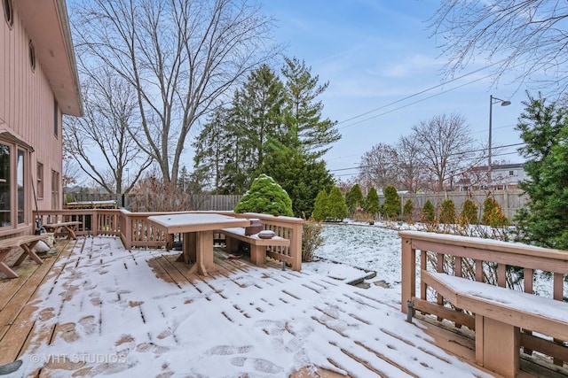 view of snow covered deck