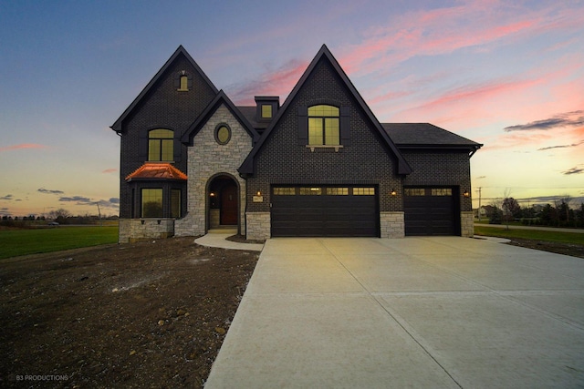 french country inspired facade with a garage