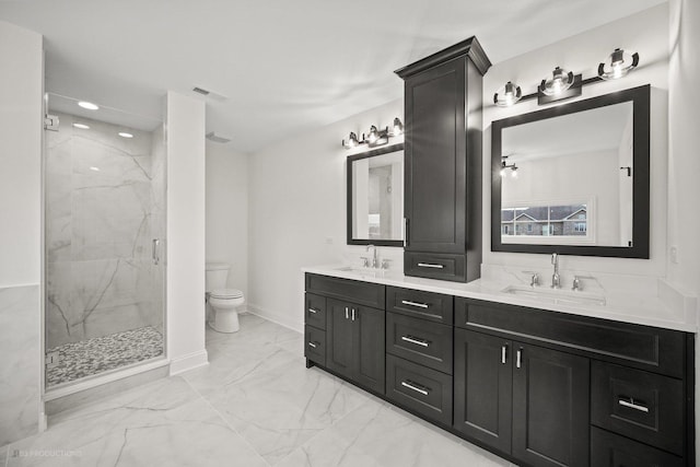 bathroom featuring toilet, an enclosed shower, and vanity