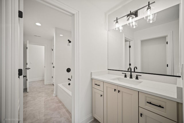 bathroom with vanity and shower / bathtub combination