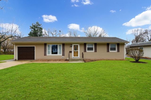 ranch-style house featuring a garage and a front lawn