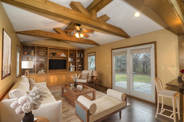 living room with hardwood / wood-style floors, lofted ceiling with beams, and ceiling fan