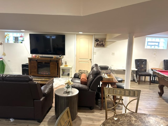 living room with light hardwood / wood-style flooring