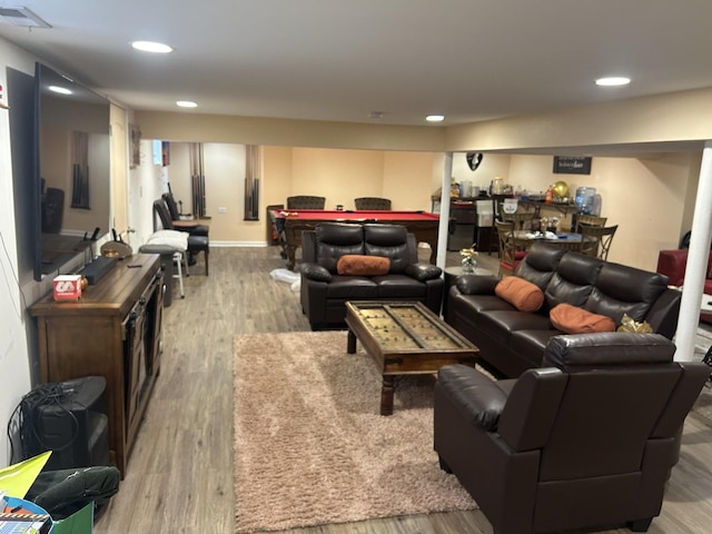 living room with light hardwood / wood-style floors