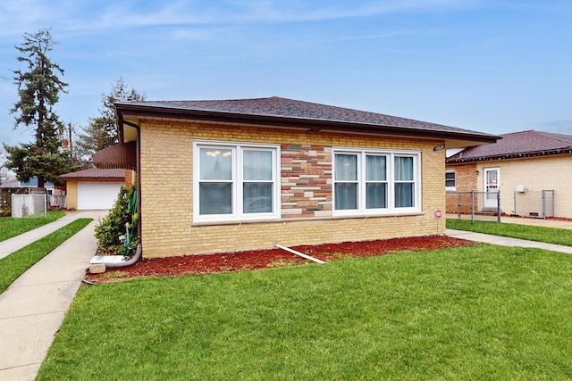 view of property exterior with a yard and a garage