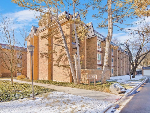 view of snow covered property