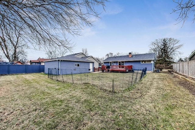 view of yard with a deck