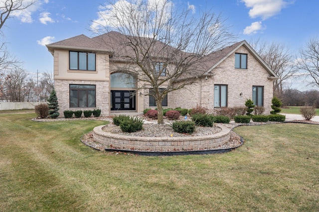 view of front of home with a front lawn