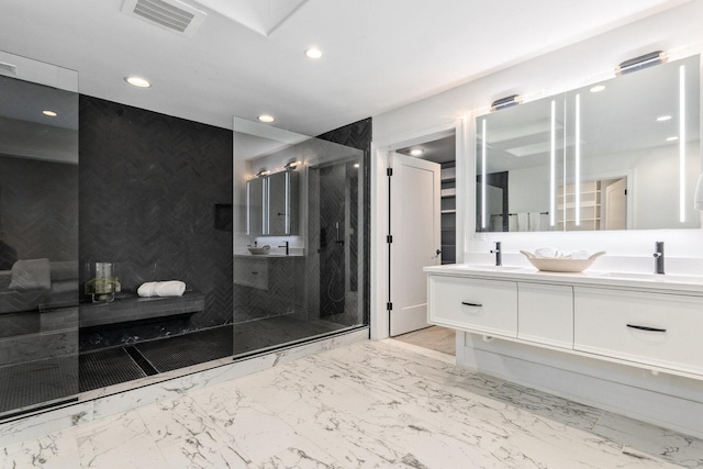 bathroom with vanity, tile walls, and walk in shower