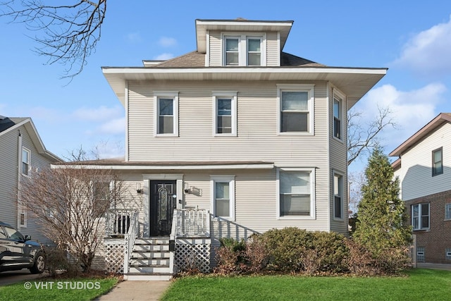 view of front of house with a front lawn