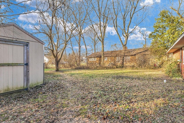 view of yard with a shed