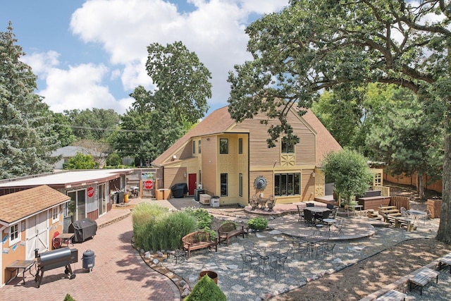 rear view of property with a patio area