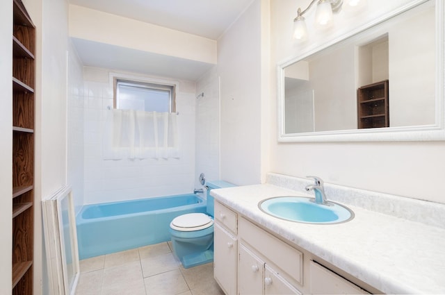 full bathroom with tile patterned flooring, vanity, tiled shower / bath combo, and toilet