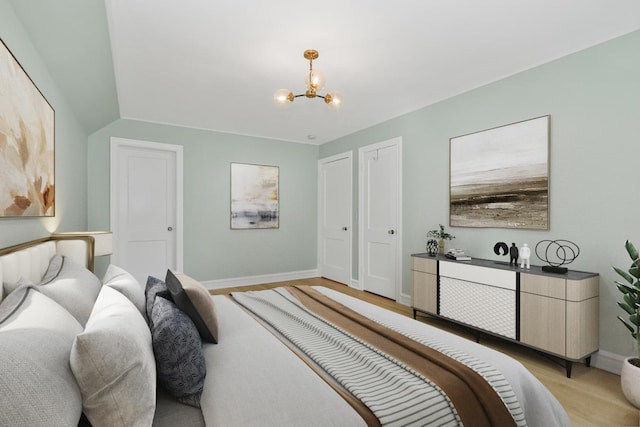 bedroom with a notable chandelier