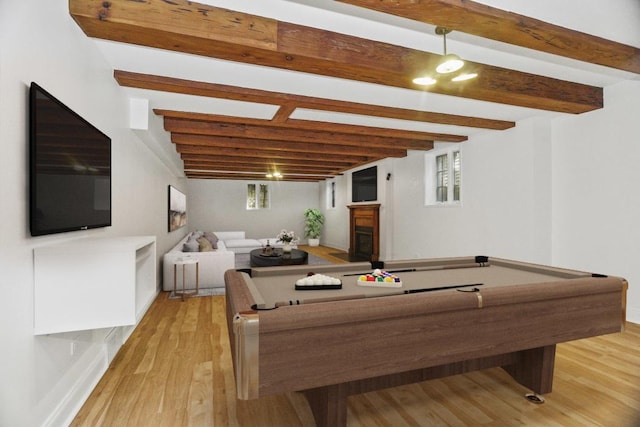 rec room with billiards, beam ceiling, and light wood-type flooring