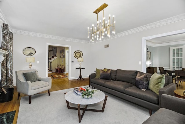 living room featuring wood-type flooring and an inviting chandelier