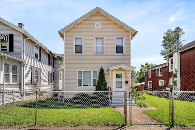 front facade featuring a front yard