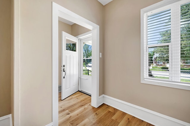 foyer with light hardwood / wood-style flooring