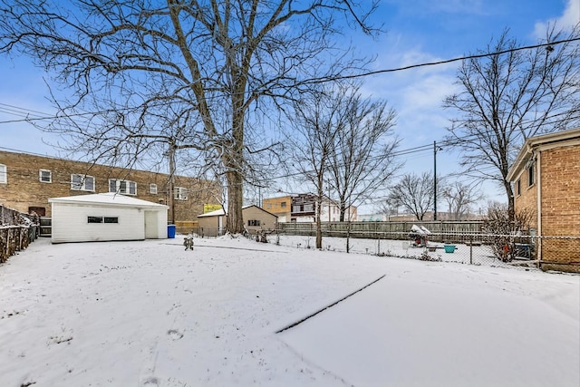 view of yard covered in snow