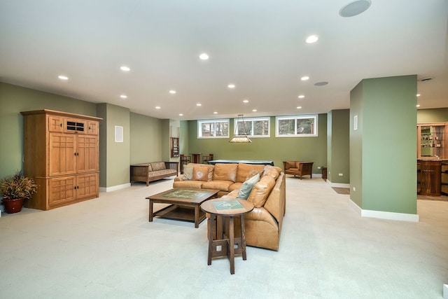 living room featuring light carpet