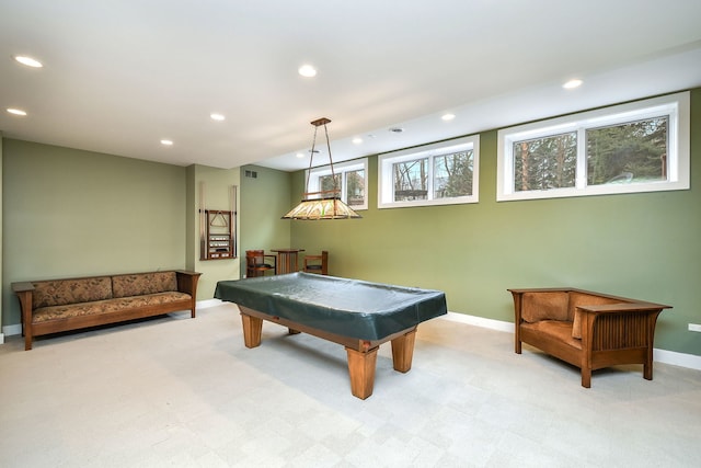 rec room with pool table and light colored carpet