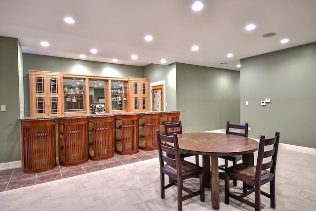 dining room featuring bar