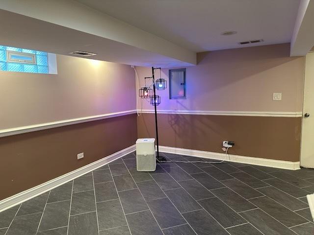 basement with electric panel