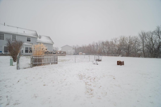 view of yard covered in snow