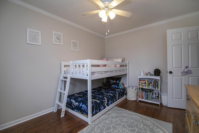 bedroom featuring ceiling fan, dark hardwood / wood-style flooring, and crown molding