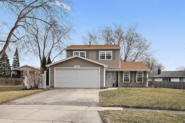 front facade featuring a garage and a front yard