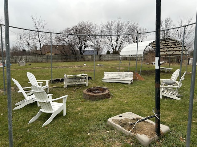 view of yard featuring a fire pit