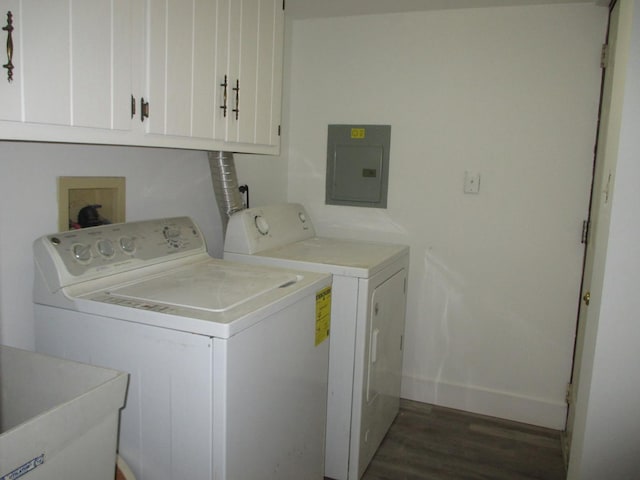 laundry room with sink, cabinets, dark wood-type flooring, electric panel, and washer and dryer