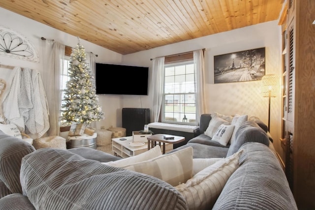 living room featuring vaulted ceiling and wood ceiling