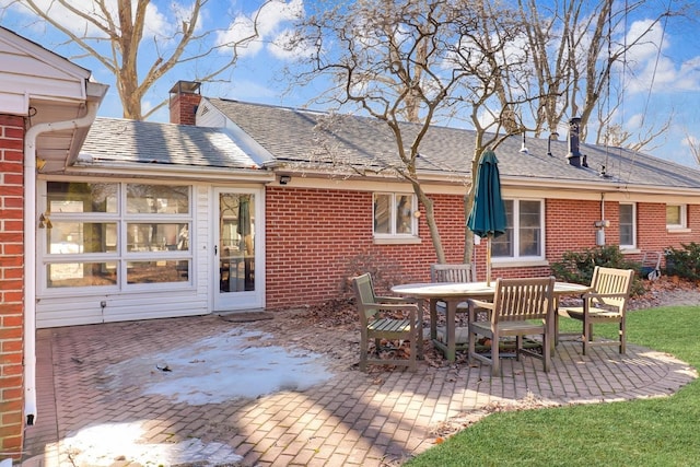 rear view of house featuring a patio area