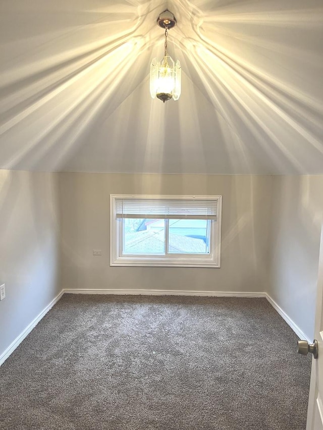 bonus room featuring carpet flooring and lofted ceiling