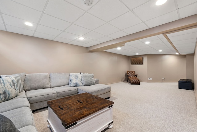 carpeted living room featuring baseboards and recessed lighting