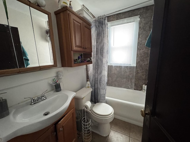 full bathroom featuring toilet, vanity, tile patterned floors, and shower / bathtub combination with curtain