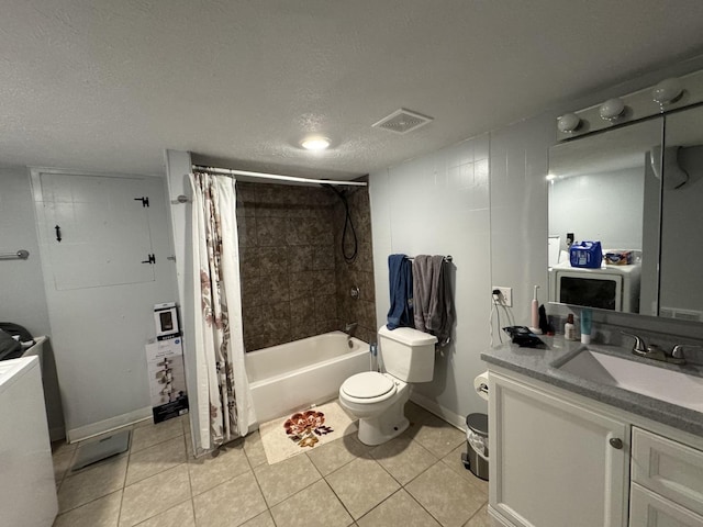 full bathroom with shower / bath combination with curtain, tile patterned floors, vanity, a textured ceiling, and toilet