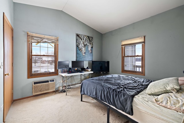 bedroom with lofted ceiling, carpet flooring, a baseboard radiator, and a wall unit AC