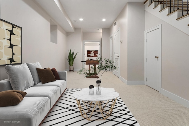 living room featuring light colored carpet