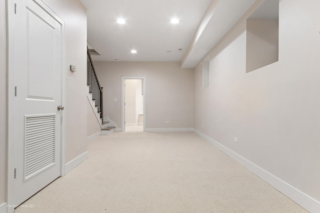 basement with light carpet