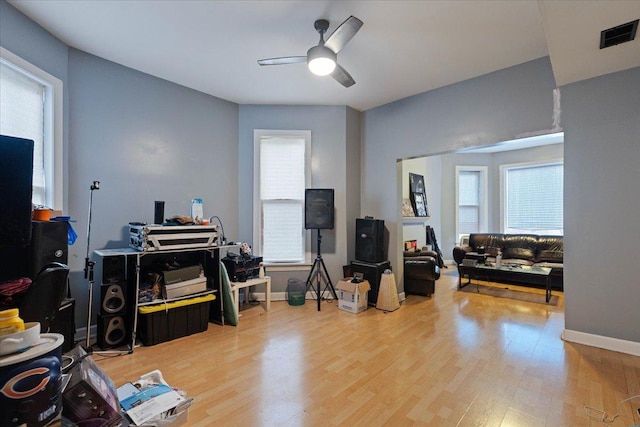 misc room with ceiling fan and hardwood / wood-style floors