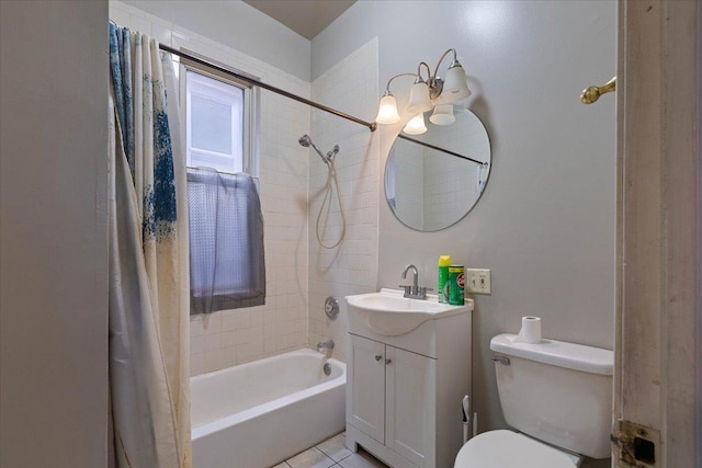 full bathroom featuring tile patterned floors, vanity, toilet, and shower / tub combo