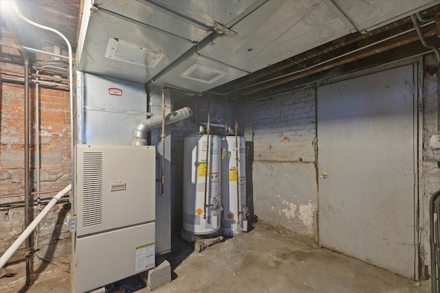 utility room featuring gas water heater