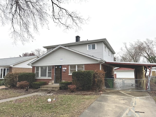 view of front of home featuring a carport