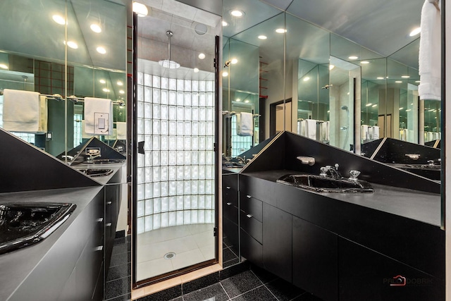 bathroom with tile patterned flooring and vanity