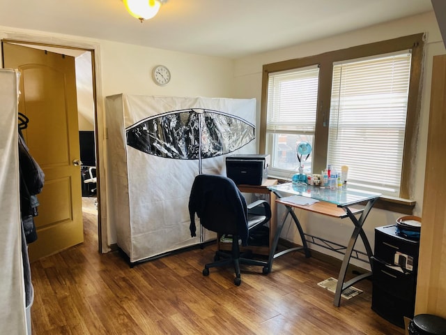 home office featuring hardwood / wood-style flooring