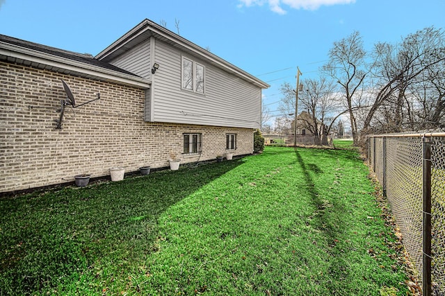 view of property exterior featuring a yard